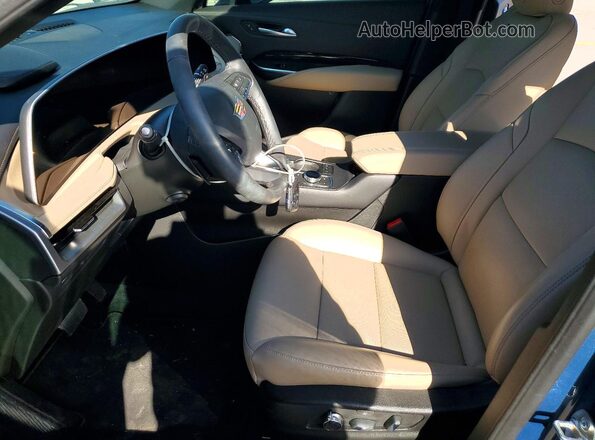 1GYFZDR4XSF154223 2025 CADILLAC XT4 Blue Vista interior delantera