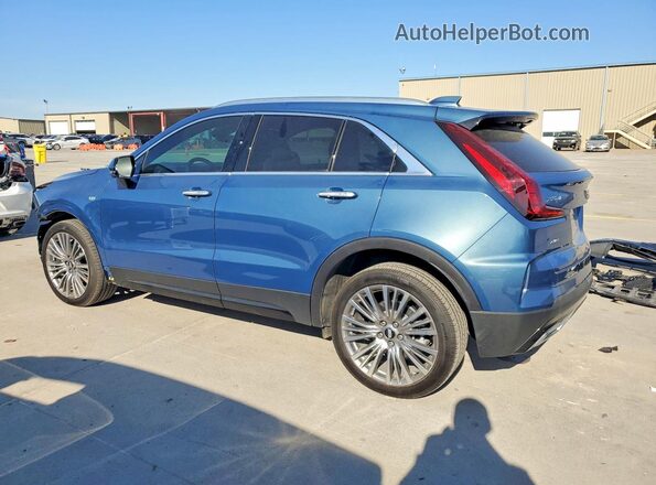 1GYFZDR4XSF154223 2025 CADILLAC XT4 Blue Trasero izquierdo