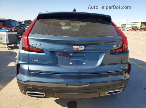 1GYFZDR4XSF154223 2025 CADILLAC XT4 Blue Vista trasera