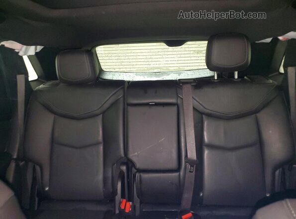 1GYKNDR4XMZ234309 2021 CADILLAC XT5 Red Rear seats view