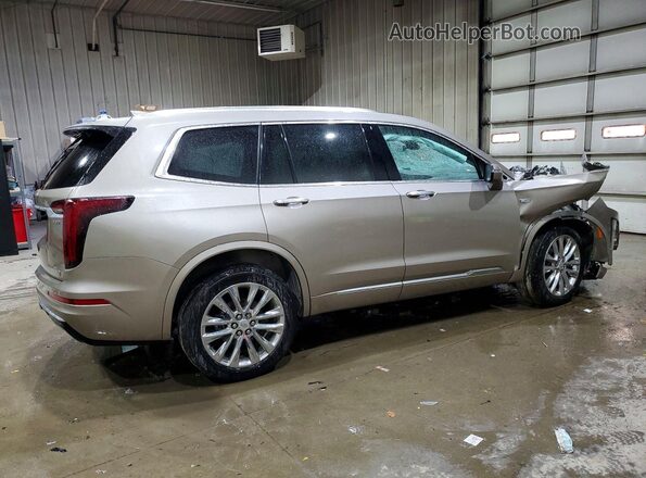 1GYKPDRS3PZ112825 2023 CADILLAC OTHER Желто-коричневый Задняя правая четверть