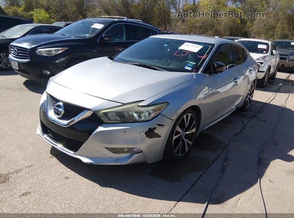 1N4AA6AP0HC445418 2017 NISSAN MAXIMA Серебряный Передняя левая четверть