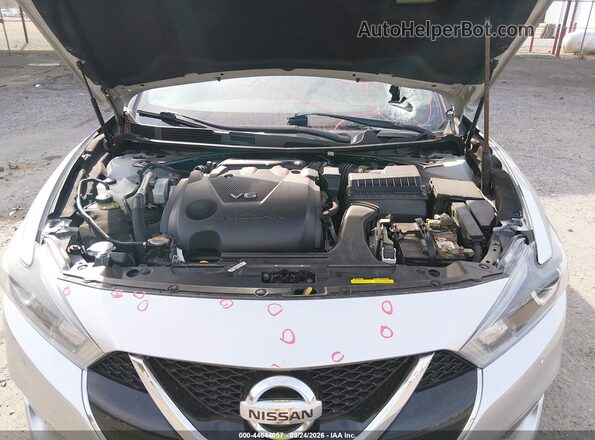 1N4AA6AP6JC379804 2018 NISSAN MAXIMA Silver Rear view