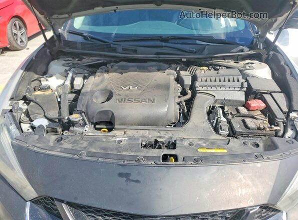 1N4AA6AP7JC406668 2018 NISSAN MAXIMA PLATINUM Серебряный Вид задней части салона
