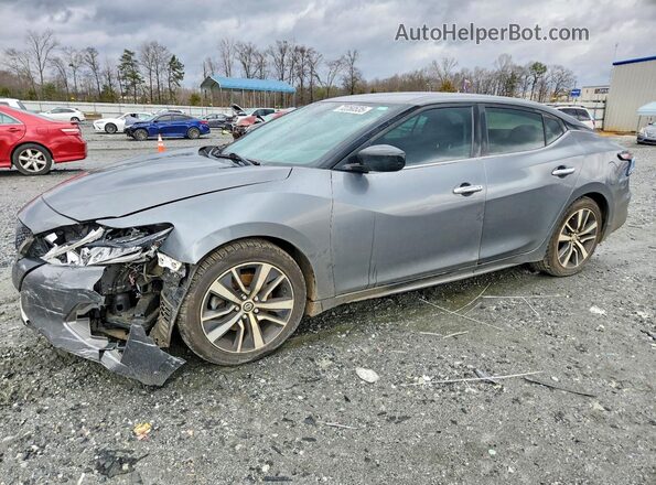 1N4AA6AV2KC379301 2019 NISSAN MAXIMA Серебряный Передняя левая четверть