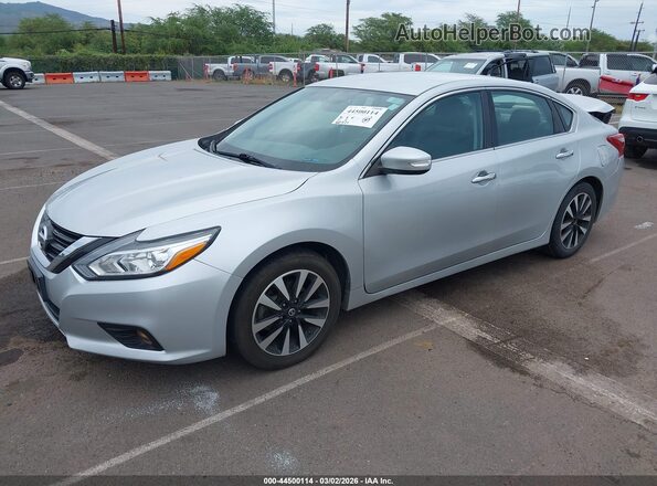 1N4AL3AP3JC122673 2018 NISSAN ALTIMA Silver Vista tres cuartos delantera izquierda