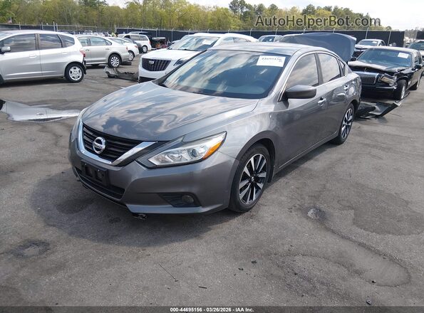 1N4AL3AP8JC202213 2018 NISSAN ALTIMA Gray Vista tres cuartos delantera izquierda