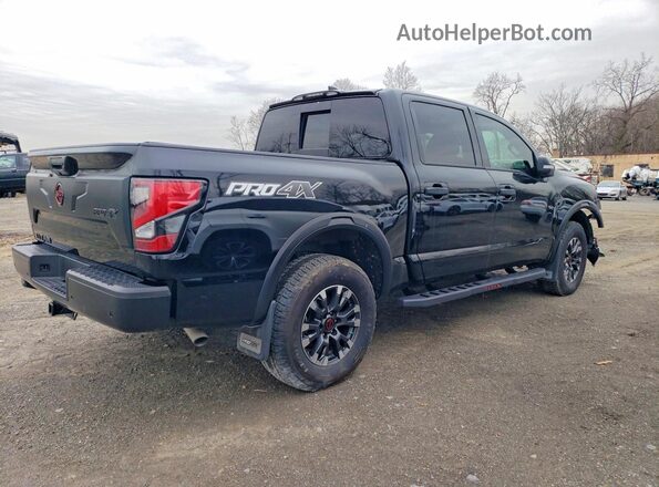 1N6AA1ED6RN112950 2024 NISSAN TITAN Черный Задняя правая четверть