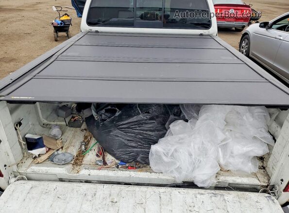 1N6AD0CWXJN762875 2018 NISSAN FRONTIER Белый Вид задних сидений