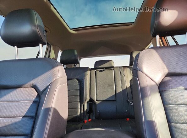 1V2NR2CA8JC503687 2018 VOLKSWAGEN ATLAS Silver Vista de los asientos traseros