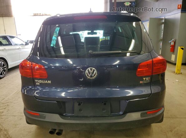 WVGBV7AX3GW609228 2016 VOLKSWAGEN TIGUAN Синий Вид салона спереди