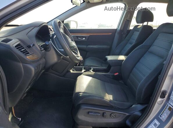 7FARW1H58HE000423 2017 HONDA CRV Серебряный Вид панели приборов
