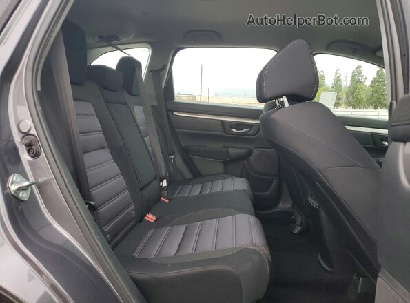 2HKRW5H38JH417355 2018 HONDA CRV Серый Вид задней части салона
