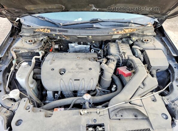 JA32U2FU5GU007868 2016 MITSUBISHI LANCER Черный Вид подкапотного пространства