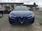 2018 Alfa Romeo Stelvio Ti Sport Blue vin: ZASFAKNN9J7B85530