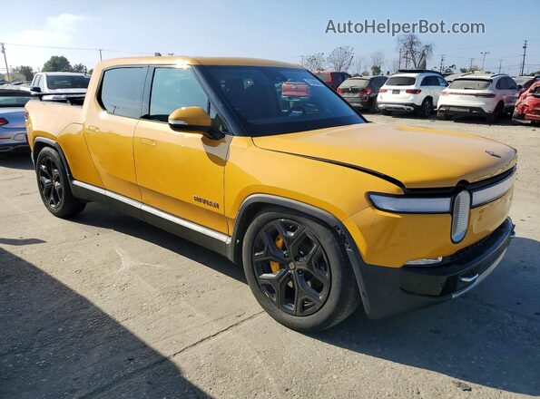 7FCTGAAA2PN019677 2023 RIVIAN RIT Желтый Вид спереди