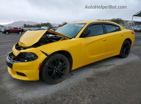 2C3CDXBG1JH167568 2018 DODGE CHARGER Желтый Передняя левая четверть