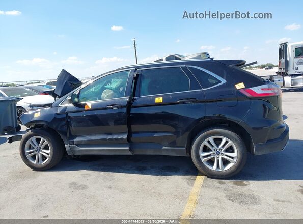 2FMPK3J9XLBA91574 2020 FORD EDGE Black Widok wnętrza z tyłu