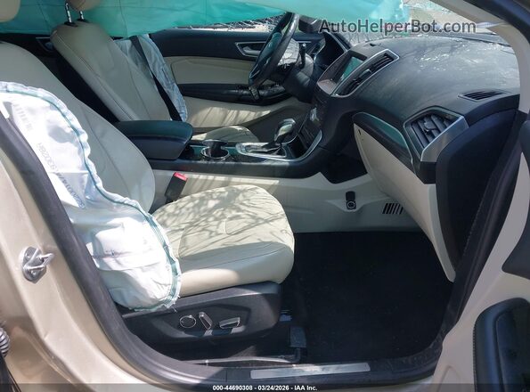 2FMPK3K94HBC07292 2017 FORD EDGE Золотой Вид салона спереди