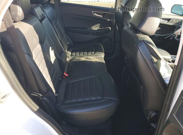 2FMPK4J92RBA98212 2024 FORD EDGE White Vista interior trasera