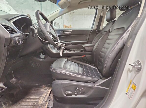 2FMPK4J93KBB07604 2019 FORD EDGE Белый Вид салона спереди