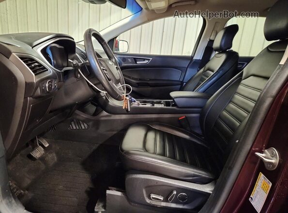 2FMPK4J94KBC67913 2019 FORD EDGE Maroon Vista interior delantera