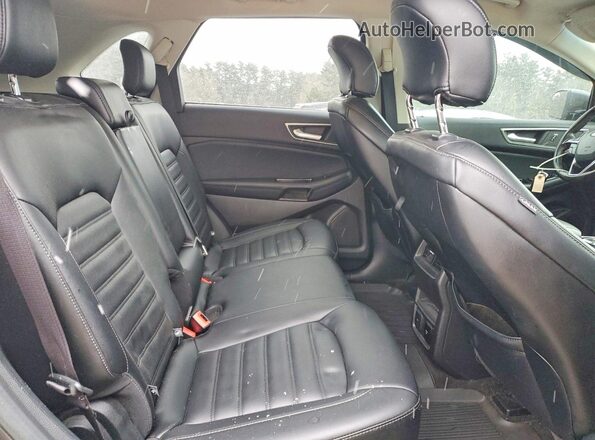 2FMPK4J95KBC03220 2019 FORD EDGE Gray Vista interior trasera