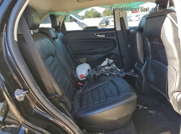 2FMPK4J96RBA47232 2024 FORD EDGE Black Widok wnętrza z tyłu