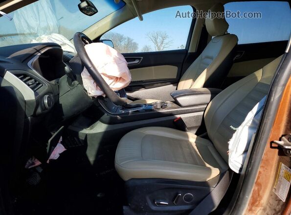 2FMPK4J97HBB11079 2017 FORD EDGE Оранжевый Вид салона спереди