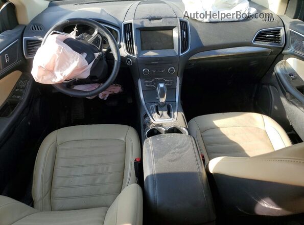 2FMPK4J97HBB11079 2017 FORD EDGE Оранжевый Вид панели приборов