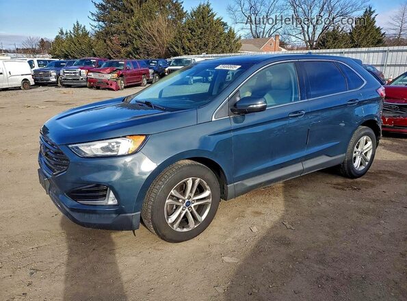 2FMPK4J98KBB84713 2019 FORD EDGE Blue Vista tres cuartos delantera izquierda