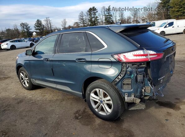 2FMPK4J98KBB84713 2019 FORD EDGE Blue Trasero izquierdo