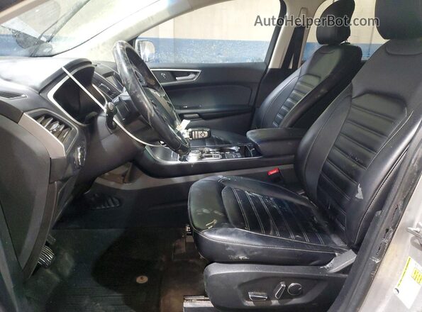2FMPK4J99KBC34230 2019 FORD EDGE Серебряный Вид салона спереди