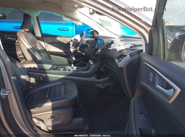2FMPK4J9XRBA44012 2024 FORD EDGE Gray Vista interior delantera