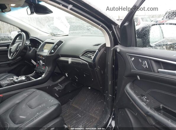 2FMPK4K93KBB74072 2019 FORD EDGE Черный Вид салона спереди