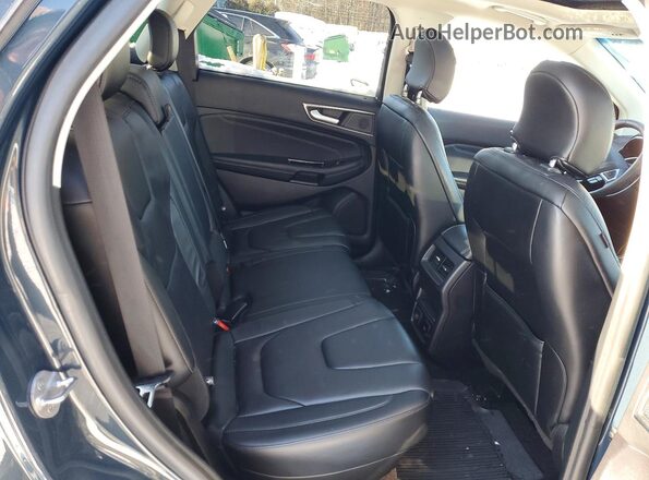2FMPK4K96KBB44323 2019 FORD EDGE Black Vista interior trasera