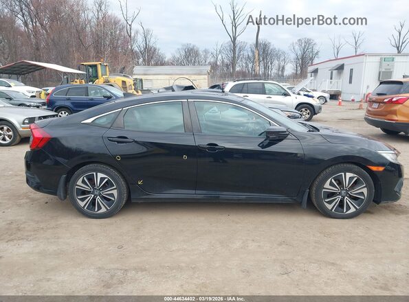 2HGFC1F72HH653000 2017 HONDA CIVIC Черный Вид задней части салона