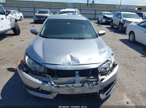 2HGFC2F51JH581930 2018 HONDA CIVIC Серебряный Вид щитка приборов