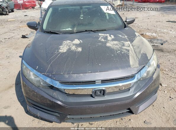 2HGFC2F59JH560615 2018 HONDA CIVIC Серый Вид задней части салона