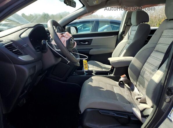 2HKRW6H35HH214469 2017 HONDA CR-V Серый Вид салона спереди