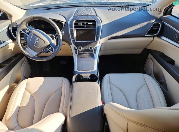 2LMPJ6J93LBL29290 2020 LINCOLN NAUTILUS Желто-коричневый Вид панели приборов