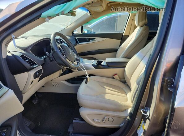 2LMPJ6J93LBL29290 2020 LINCOLN NAUTILUS Желто-коричневый Вид салона спереди