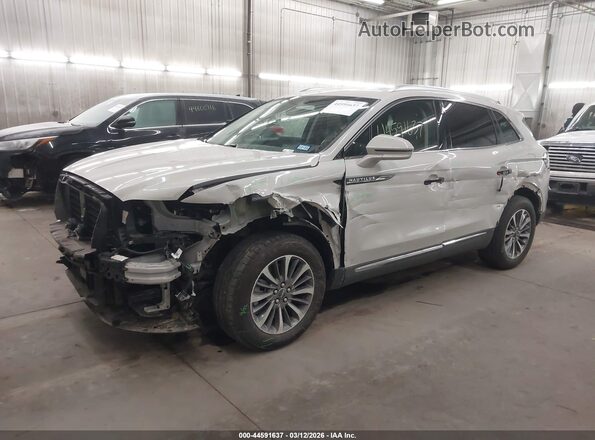 2LMPJ6J98NBL00869 2022 LINCOLN NAUTILUS Кремовый Передняя левая четверть