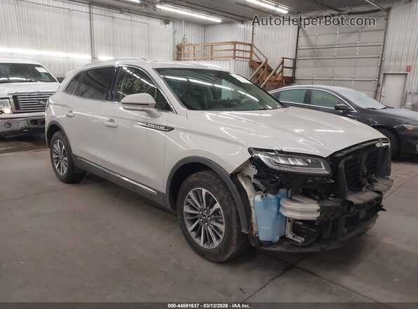 2LMPJ6J98NBL00869 2022 LINCOLN NAUTILUS Кремовый Передняя правая четверть