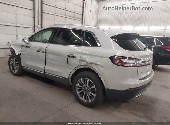 2LMPJ6J98NBL00869 2022 LINCOLN NAUTILUS Кремовый Задняя левая четверть