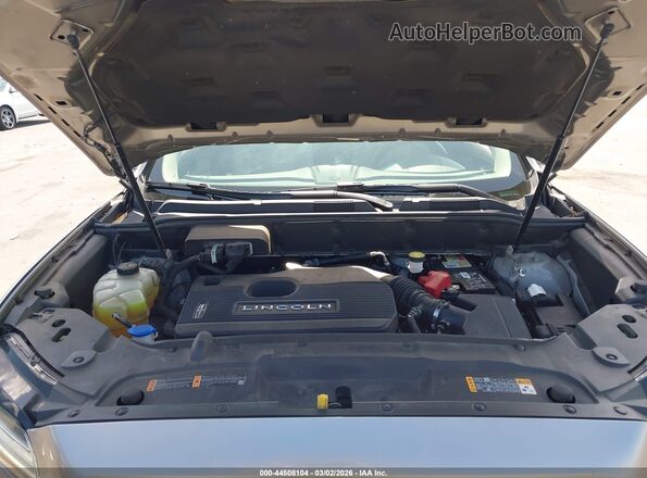 2LMPJ6L96KBL13385 2019 LINCOLN NAUTILUS Silver უკანა ხედი