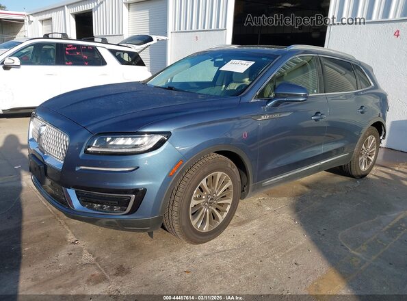 2LMPJ8K98KBL28404 2019 LINCOLN NAUTILUS Синий Передняя левая четверть