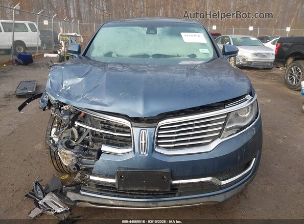 2LMPJ8LP4JBL44871 2018 LINCOLN MKX Синий Вид щитка приборов