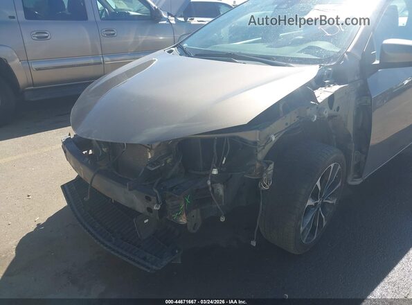 2T1BURHE1HC772803 2017 TOYOTA LL Серый Вид спереди