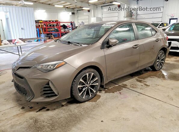 2T1BURHE4HC921124 2017 TOYOTA LL Tan Przód lewy